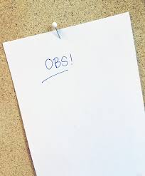 Syntolkning: Lapp med texten "Obs!" uppsatt på en vägg. Syntolkning: Lapp med texten "Obs!" uppsatt på en vägg.